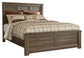 Juararo Queen Panel Bed with Mirrored Dresser, Chest and 2 Nightstands